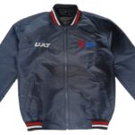 Navy blue custom bomber jacket with red trim and embroidered chest logos